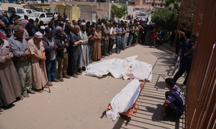 Israeli forces open fire a kilometer away from Gaza aid site, killing 3, health officials say Israeli forces open fire a kilometer away from Gaza aid site, killing 3, health officials say