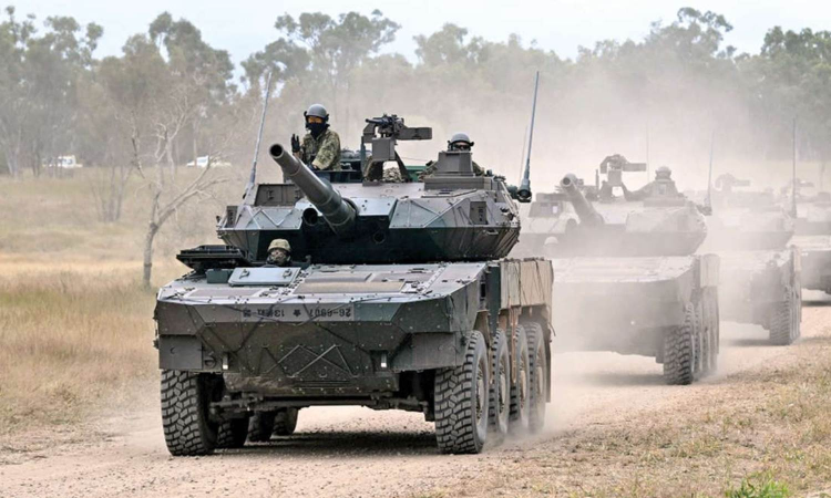 Asian Axis: Japan flexes its military muscle Asian Axis: Japan flexes its military muscle