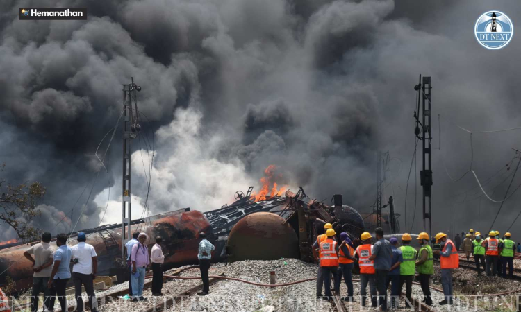 Chaos as freight train catches fire in Tiruvallur Chaos as freight train catches fire in Tiruvallur