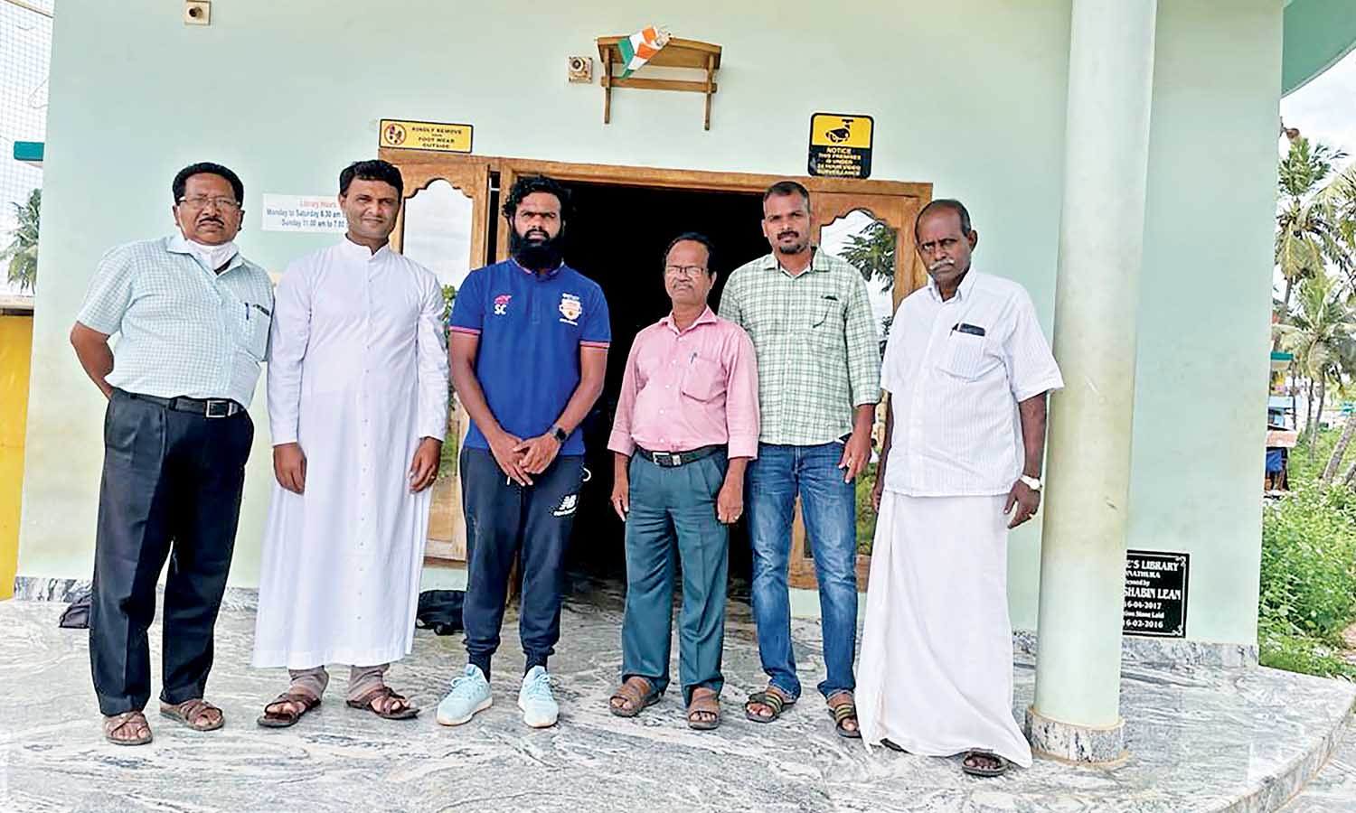 Steve Charles with the parish priest and members of the community during his visit to Thoothoor in 2021 Steve Charles with the parish priest and members of the community during his visit to Thoothoor in 2021