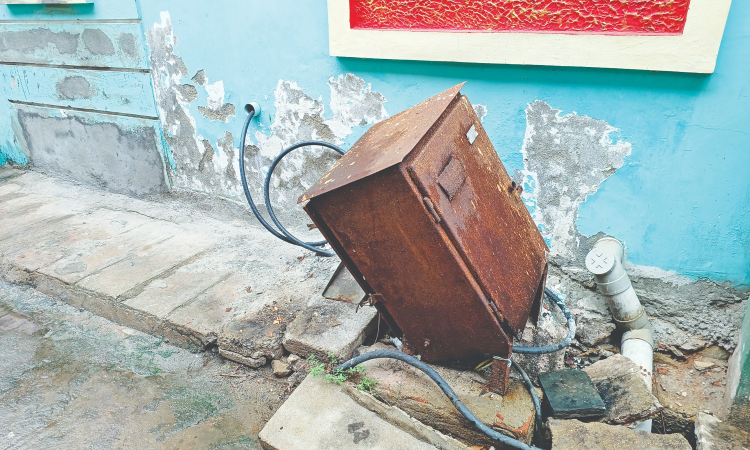Exposed EB boxes, 50-yr-old power poles keep Ernavoor residents on toes