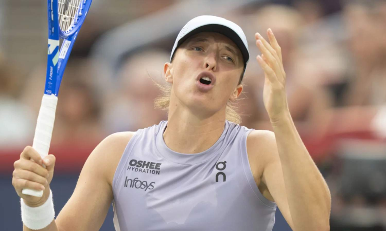 Tauson upsets 2nd-seeded Wimbledon champion Swiatek to reach Montreal quarterfinals