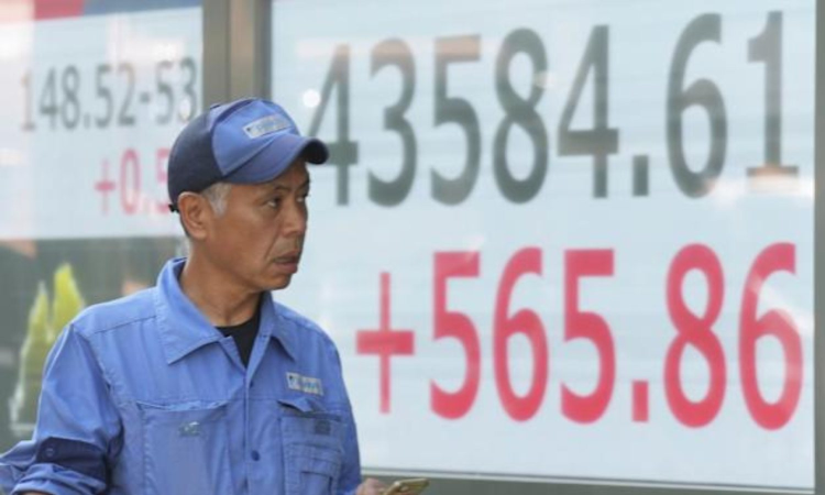 Global shares rise after Japans prime minister announces plan to resign Global shares rise after Japans prime minister announces plan to resign