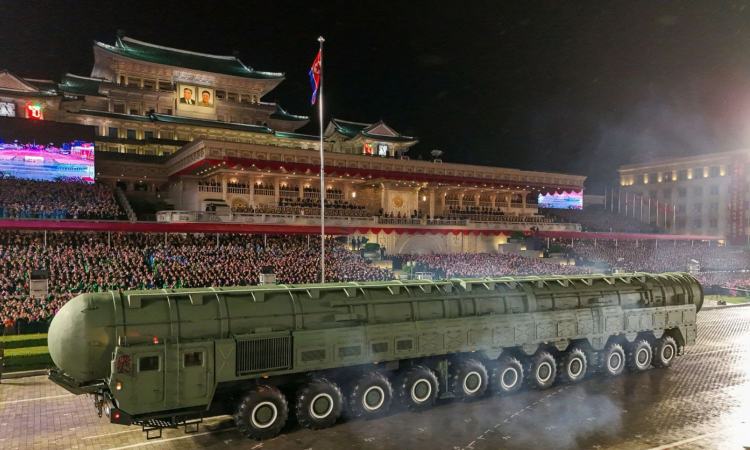North Korea displays new long-range missile at military parade celebrating Kim Jong Un